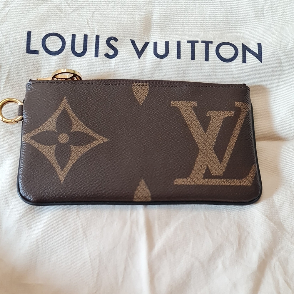 Louis vuitton reverse trio pouch